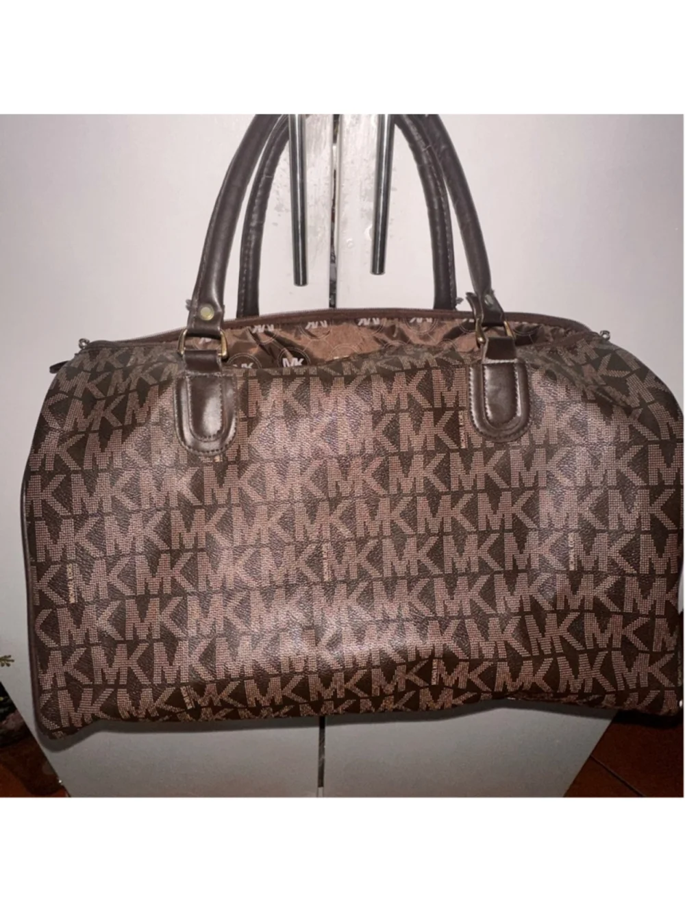 Michael Kors brown Monogram duffel bag